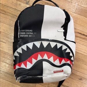 Sprayground Black and White Shark Backpack with Red Accents